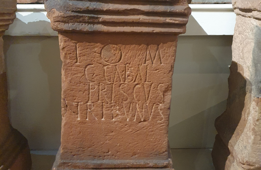 Roman altars found at Maryport, and house in the Senhouse Roman Museum 